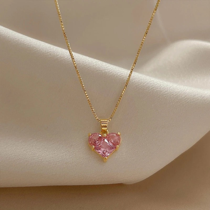 Endearing Pink Crystal Love Pendant Golden Metal Necklace / Ruchi