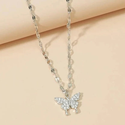 Enchanting Double Layered Crystal Figurine Pendant Clavicle Metal Necklace / Ruchi