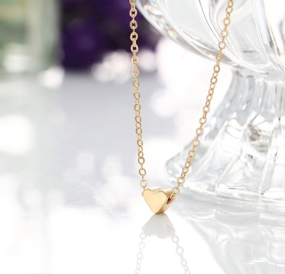 Endearing Love Pendant Golden Metal Necklace For Women / Ruchi