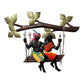Endearing Metal Wall Hanging Of Village Couple On Swing / Ruchi