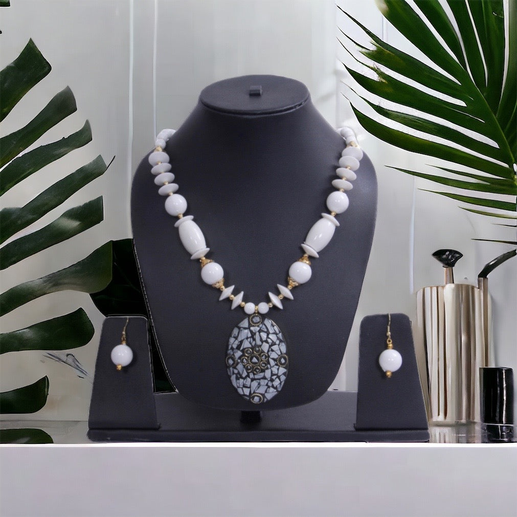 Alluring Oval Pendant White Wooden Beaded Necklace And Earrings Set / Ruchi