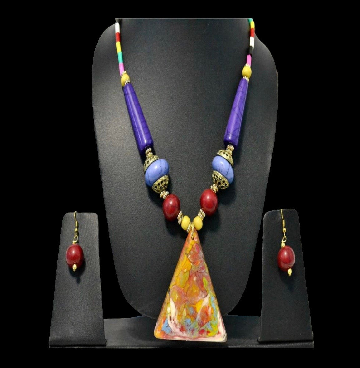 Enticing Triangular Multicolored Pendant Wooden Beaded Necklace And Earrings Set / Ruchi