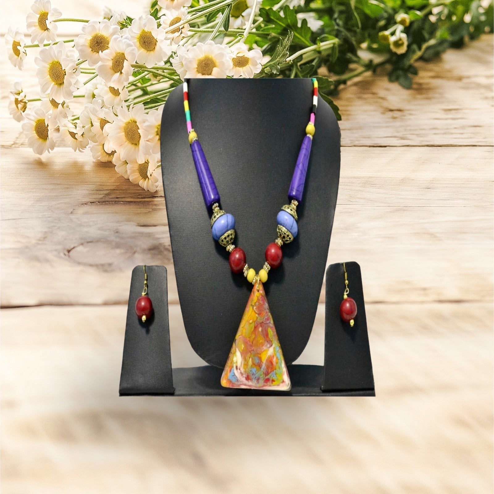 Enticing Triangular Multicolored Pendant Wooden Beaded Necklace And Earrings Set / Ruchi