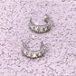 Enticing Cubic Zirconia Metal Round Hoop Earrings / Ruchi