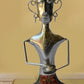 Endearing Metal Decorative Showpiece Of Figurine Playing Khanjani / Ruchi